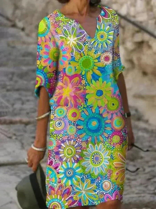 Angelique | Lebhaftes Blumen-Midi-Kleid
